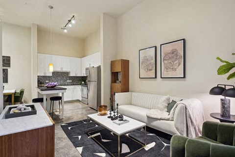 a living room with a couch and a table